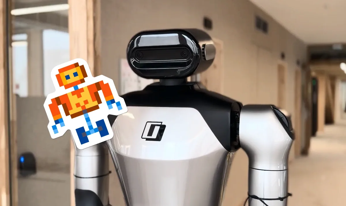 Robot humanoide con logotipo en el torso, fotografiado en un pasillo en construcción